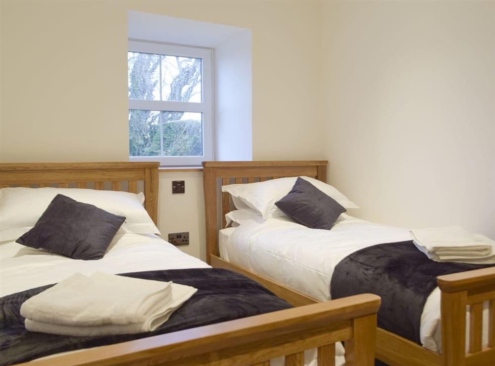 Twin bedroom at Brynhowell Barn, 