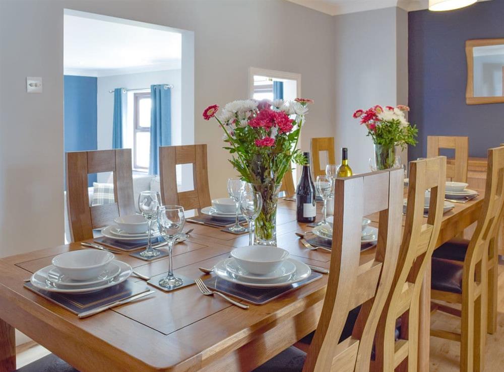 Elegant dining room at Brynhowell in Glandwr, near Narbeth, Dyfed