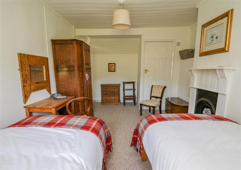 This is a bedroom at Bryniau Bychain Cottage, Pennal near Cwrt