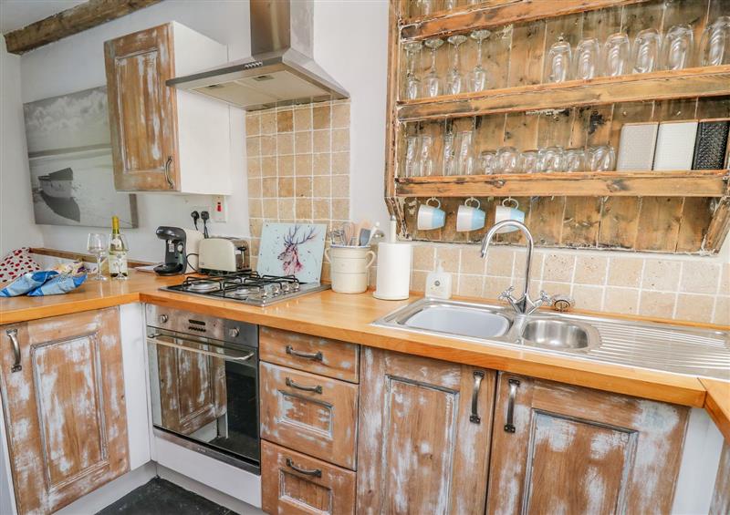 This is the kitchen (photo 2) at Bryniau Bychain Cottage, Pennal near Cwrt
