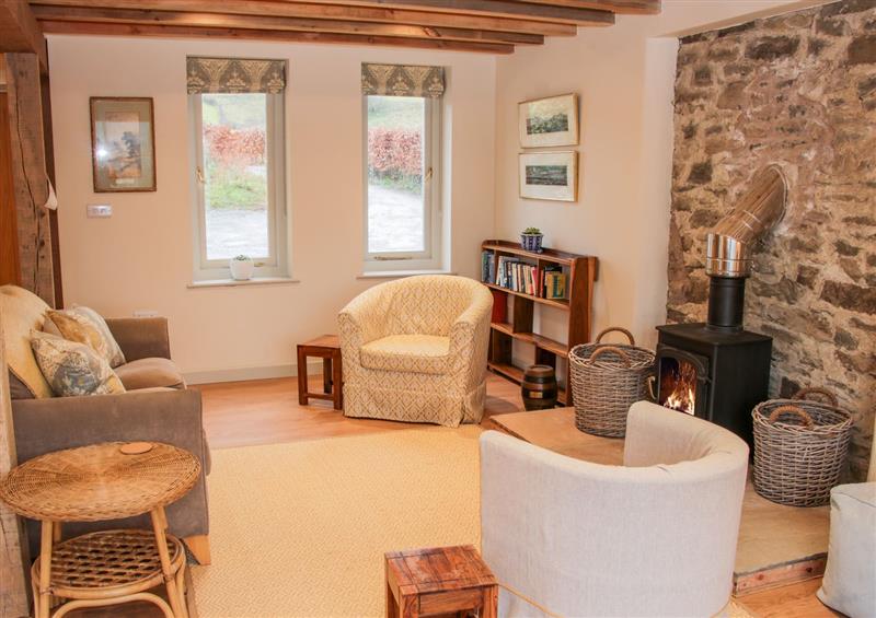 Relax in the living area at Brynlikky cottage, Chapel Lawn near Bucknell