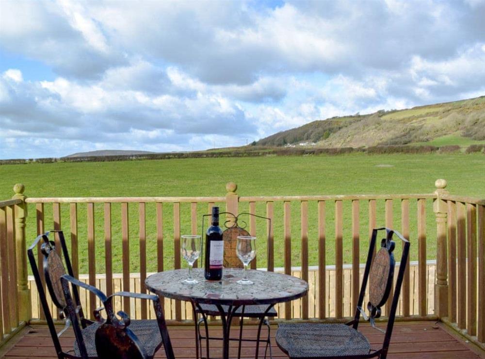Decking area with countryside views at Bryntowy in Kidwelly, Dyfed