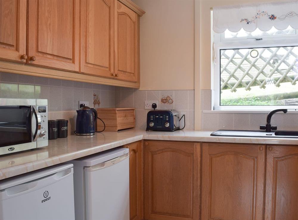 Kitchen (photo 2) at Brynymor Cottage in Llangennith, near Swansea, Glamorgan, West Glamorgan