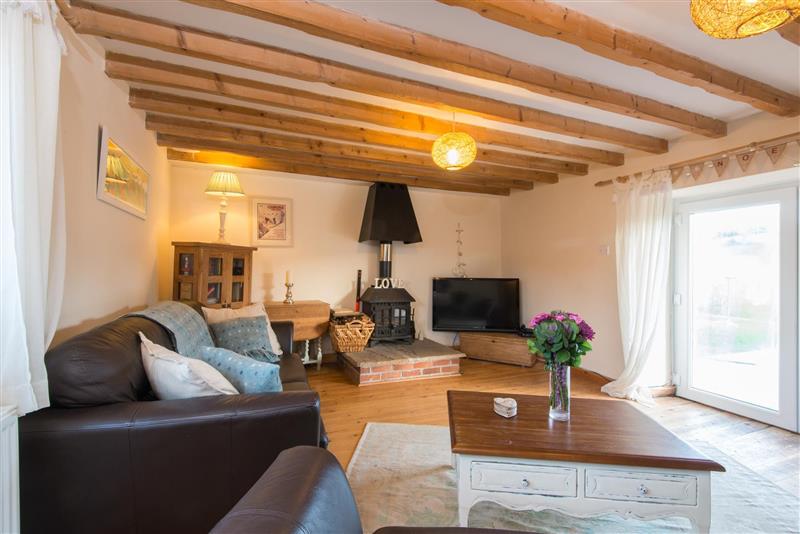 Living room at Bubble Cottage, Watergate Bay, Cornwall