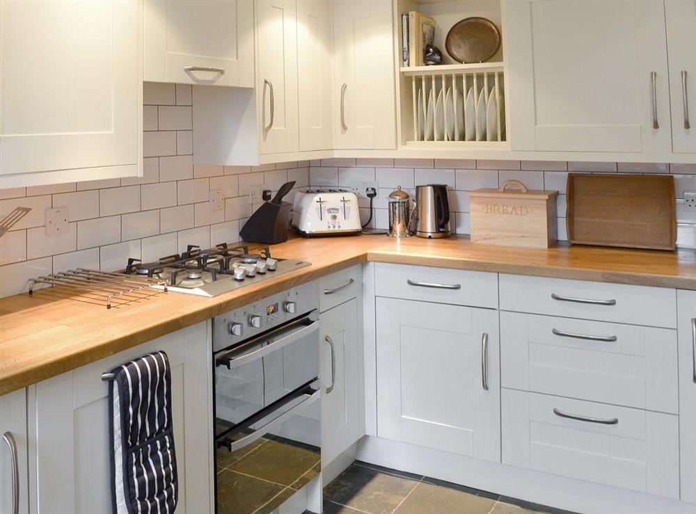 Well equipped tiled kitchen at Bucca Cottage in Newlyn, near Penzance, Cornwall
