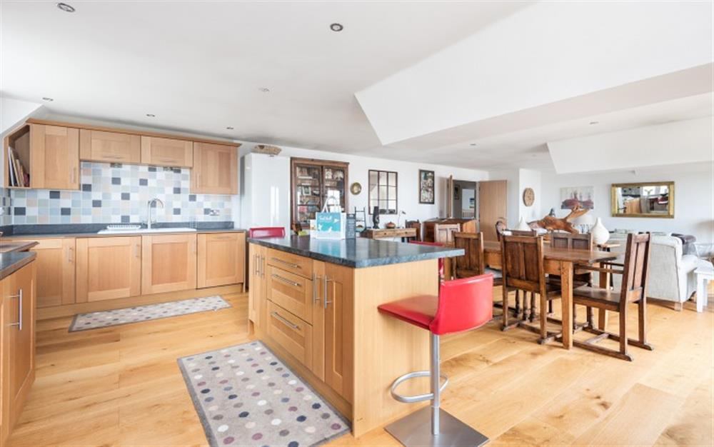 Kitchen with breakfast bar at Buckfield Penthouse in Lyme Regis