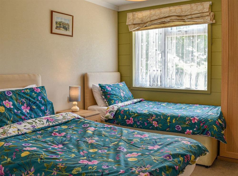 Twin bedroom at Buckland Lodge in Pentridge, Dorset