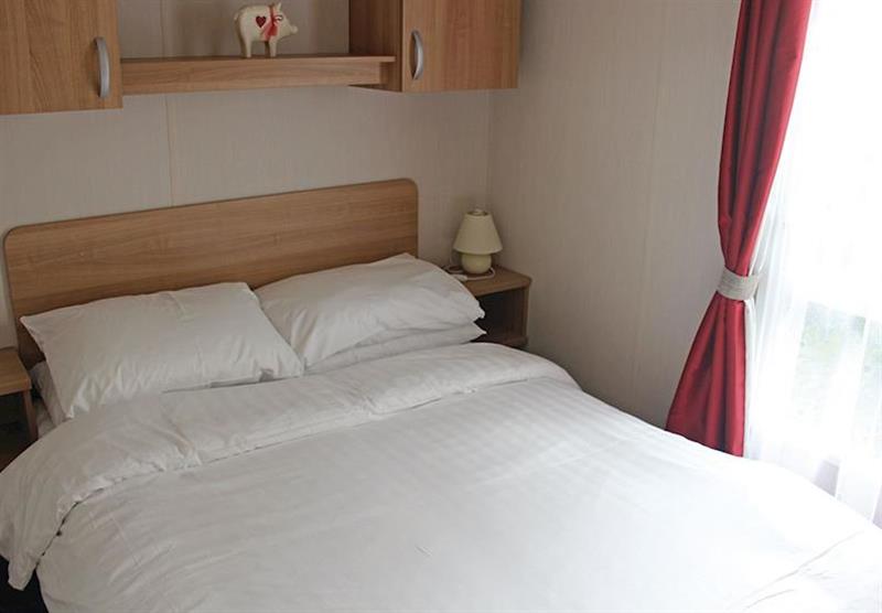 Bedroom in a typical Superior 2B caravan at Bucklegrove Holiday Park in Cheddar, Somerset