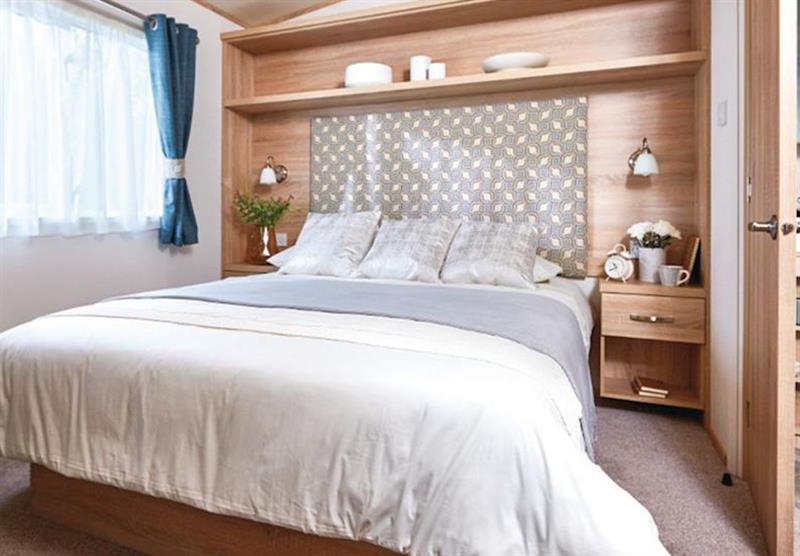 Double bedroom in a typical Luxury caravan at Bucklegrove Holiday Park in Cheddar, Somerset