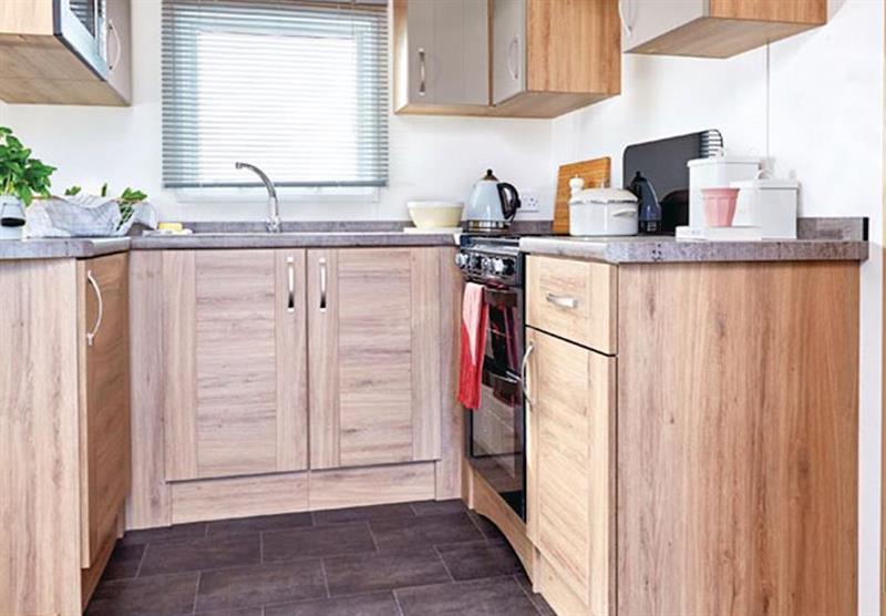 Kitchen area in a typical Luxury caravan at Bucklegrove Holiday Park in Cheddar, Somerset