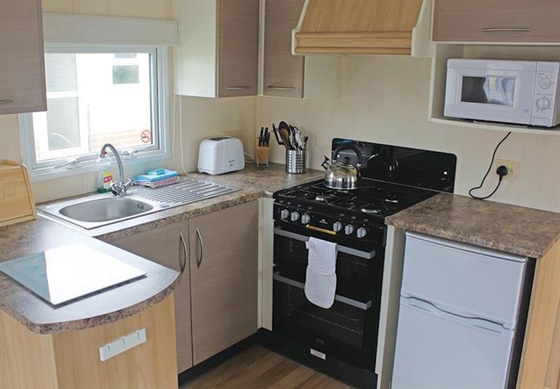 Kitchen in a typical Superior 2B caravan at Bucklegrove Holiday Park in Cheddar, Somerset