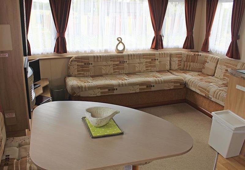 Living room in a typical Superior 2B caravan (photo number 2) at Bucklegrove Holiday Park in Cheddar, Somerset
