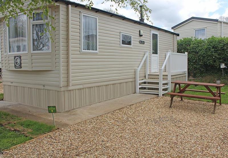 Outside a typical Superior 1B caravan at Bucklegrove Holiday Park in Cheddar, Somerset