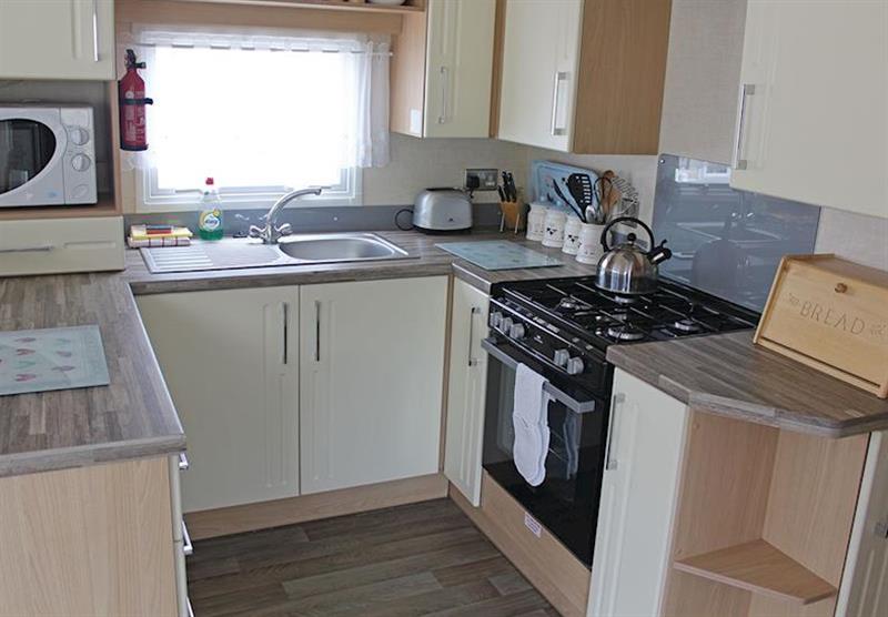 The kitchen in a typical Superior caravan at Bucklegrove Holiday Park in Cheddar, Somerset