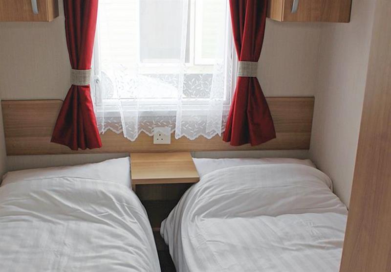 Twin bedroom in a Superior 2B caravan at Bucklegrove Holiday Park in Cheddar, Somerset
