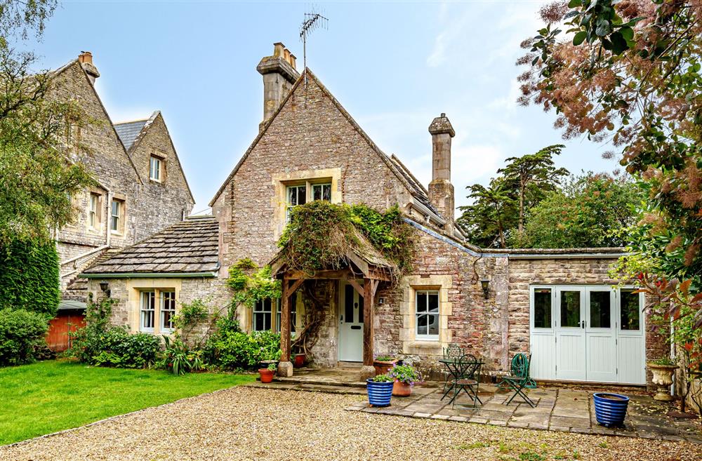 An attractive stone cottage with a stylish interior at Bucknowle Lodge, Wareham