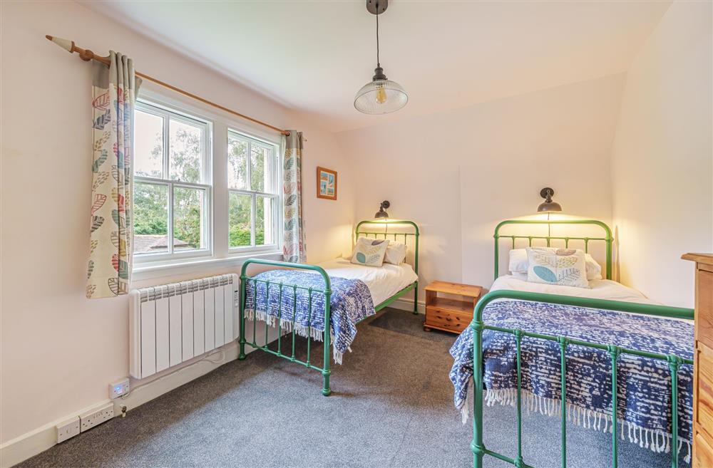 Bedroom four, located on the first floor at Bucknowle Lodge, Wareham