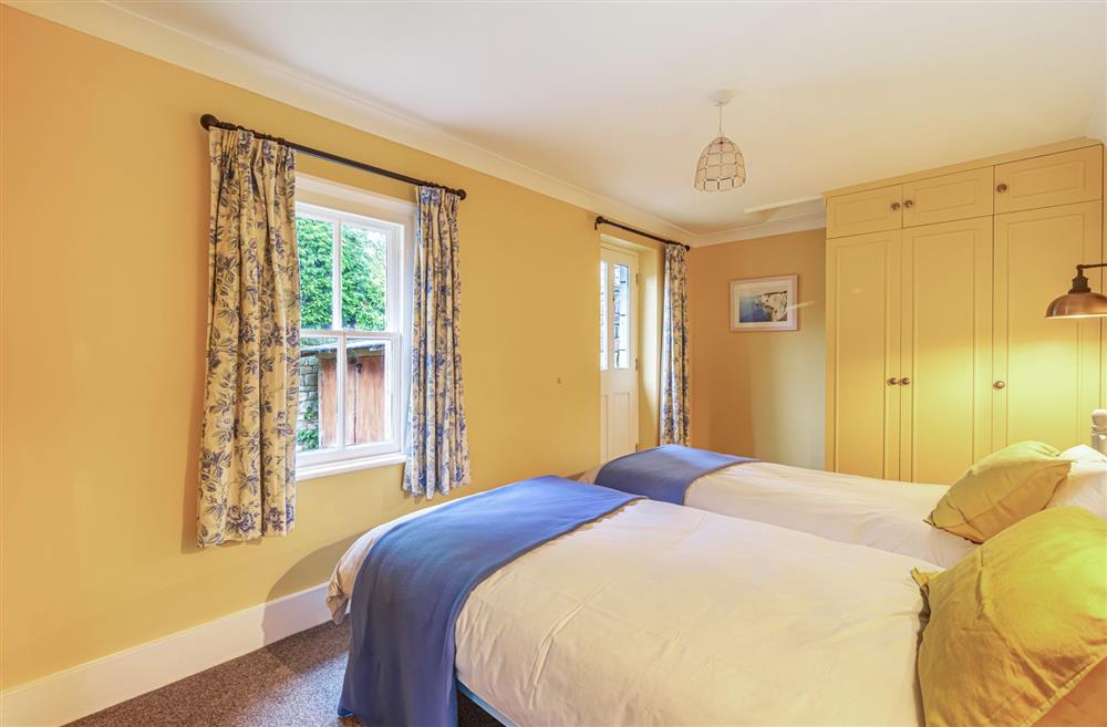 Bedroom two, located on the ground floor at Bucknowle Lodge, Wareham