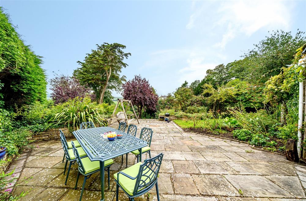 The garden terrace with lovely views at Bucknowle Lodge, Wareham