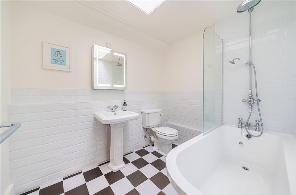 The ground floor family bathroom with shower at Bucknowle Lodge, Wareham