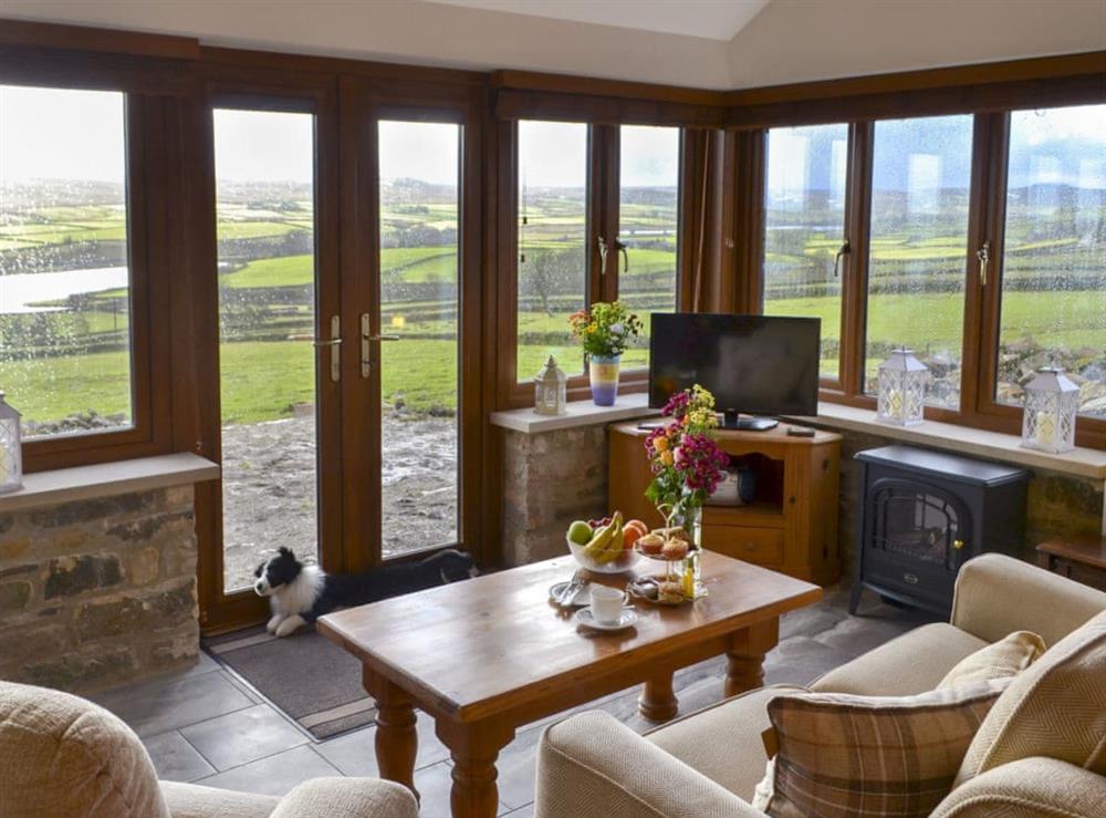 Relaxing living room with amazing views at Buckswell Cottage in Baldersdale, near Barnard Castle, County Durham, England