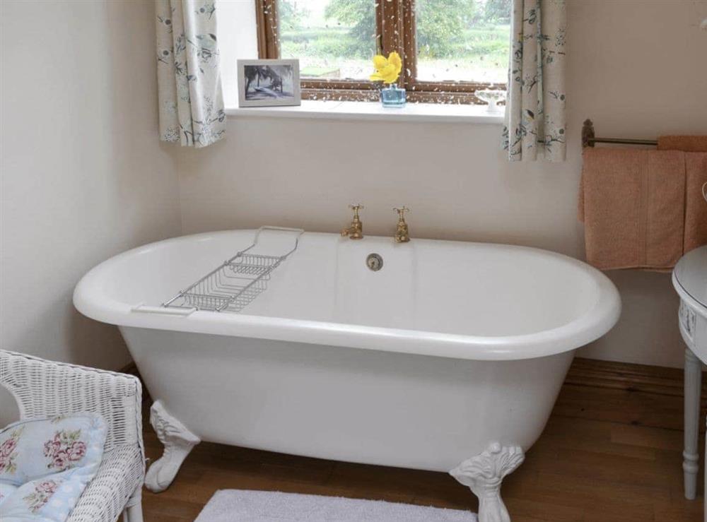 Luxurious roll top bath in family bathroom at Buddileigh Farm in Betley, near Crewe, Cheshire