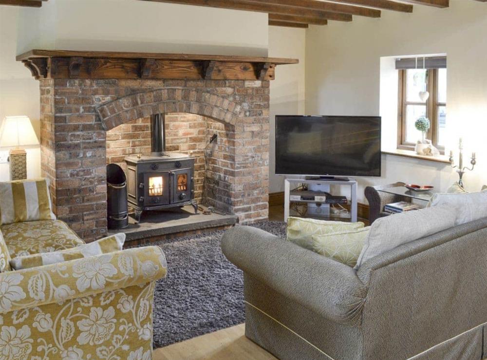 Warm and welcoming living area at Buddileigh Farm in Betley, near Crewe, Cheshire