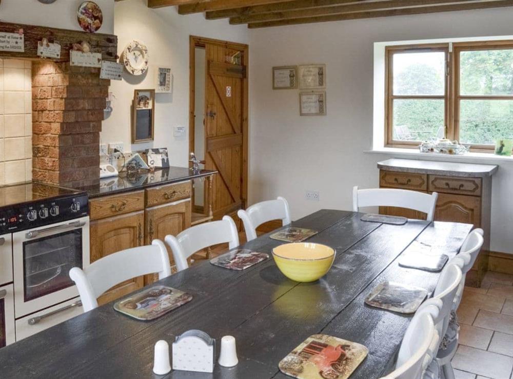 Well-equipped fitted kitchen with dining area at Buddileigh Farm in Betley, near Crewe, Cheshire