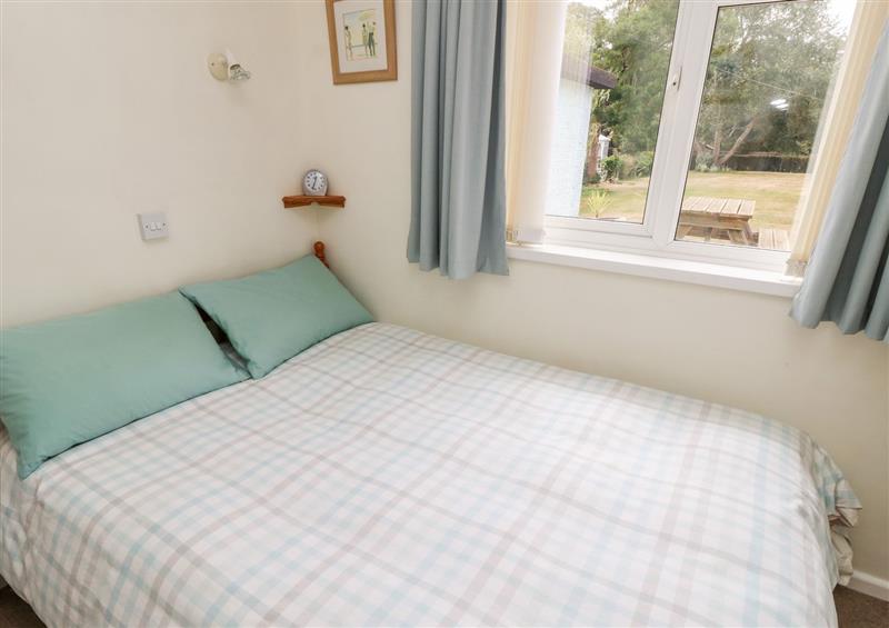 A bedroom in Buddleia Cottage at Buddleia Cottage, Seaview