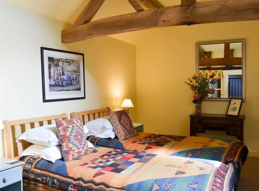 Twin bedded room with beams at Bugatti House in Bosbury, near Ledbury, Herefordshire