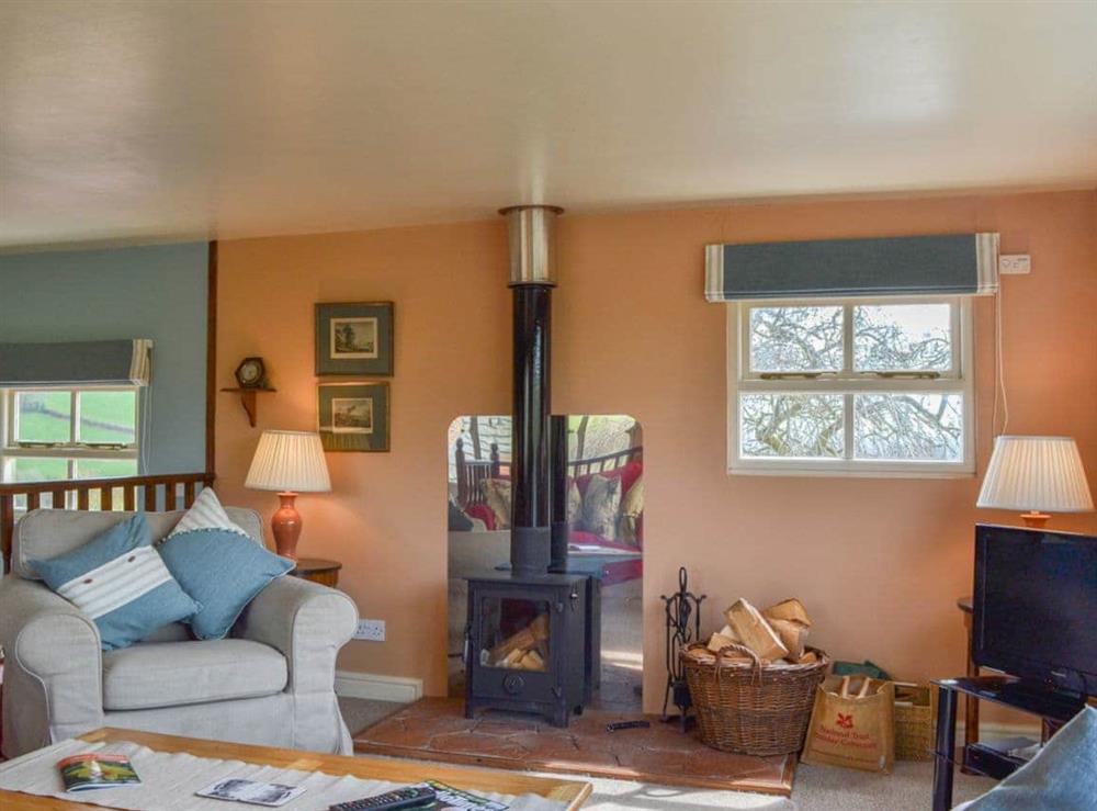 Warm and welcoming living area at Bugatti House in Bosbury, near Ledbury, Herefordshire