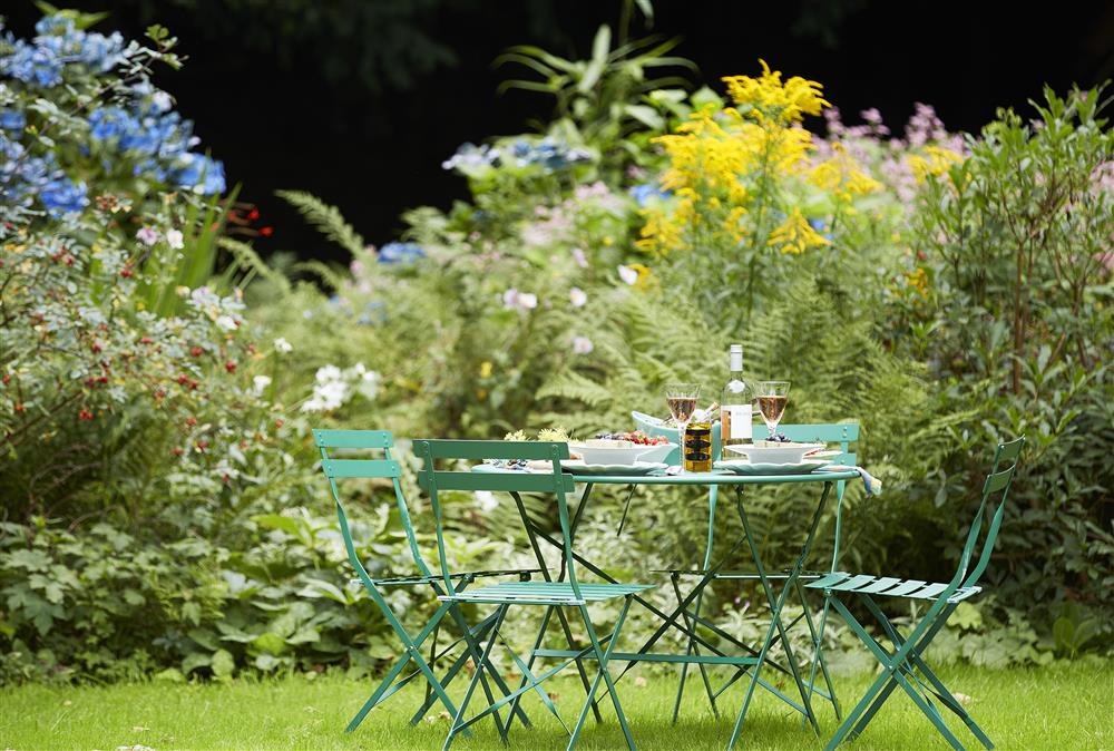 Enjoy the sunshine in your private garden  at Bull Hollow Cottage, Shrewsbury