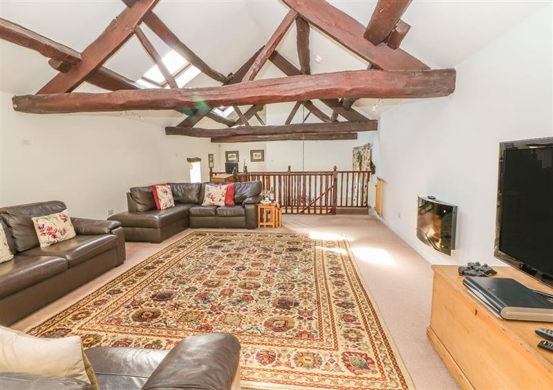 Relax in the living area at Bullace Barn, Holmfirth