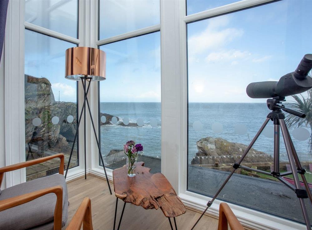 Seating area within the double bedroom at Bullens Rock in Ilfracombe, Devon