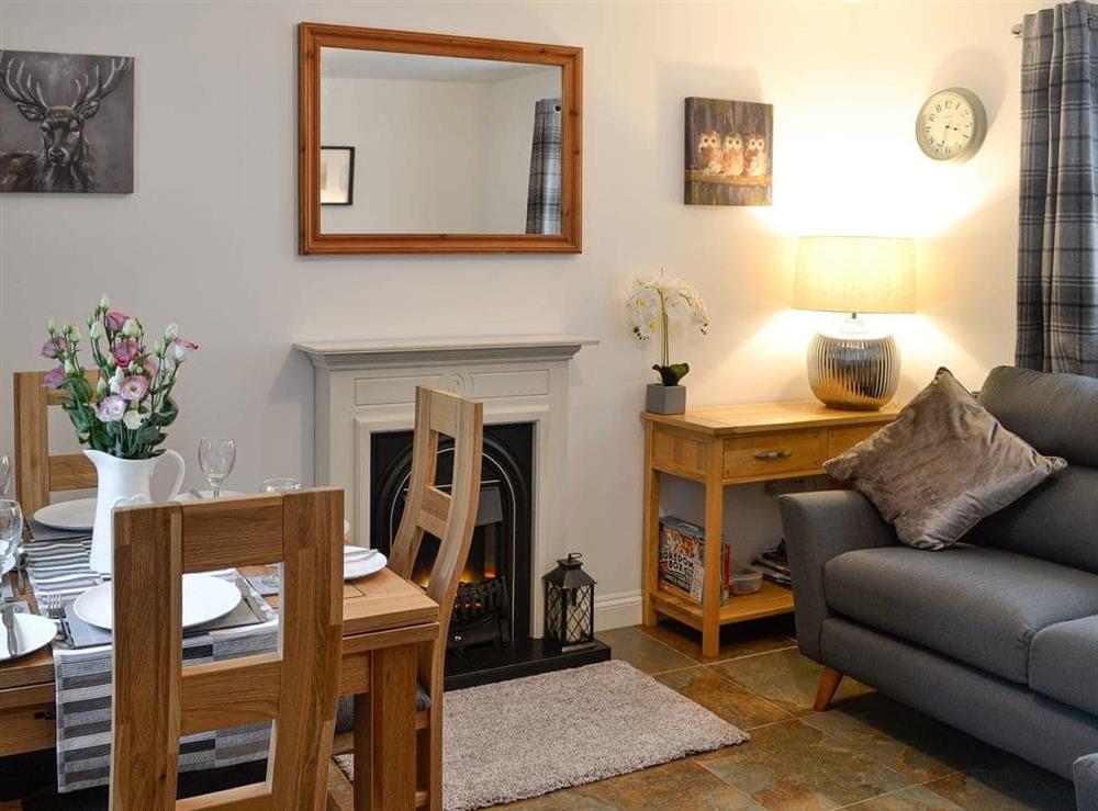 Living room with dining area at Bullions Farm Cottage in Consett, County Durham, Northumberland