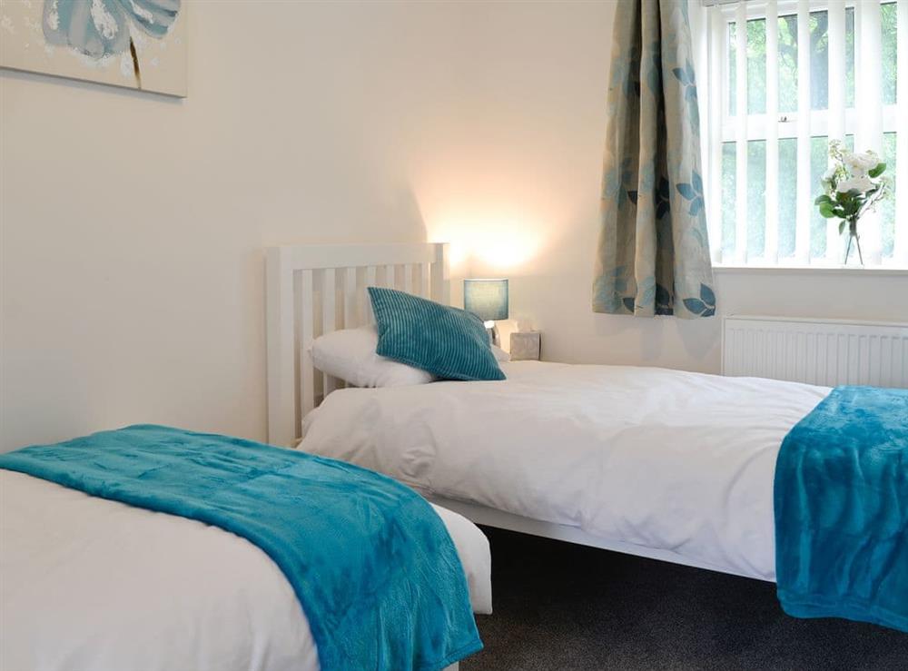 Pretty twin bedded room at Bullions Farm Cottage in Consett, County Durham, Northumberland
