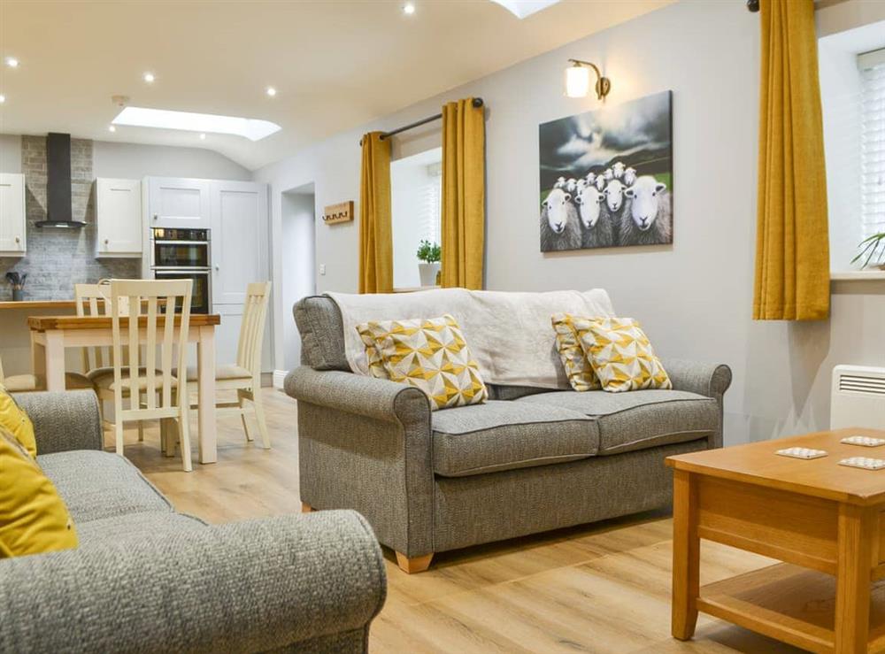 Open plan living space at Bumble Cottage in Cockermouth, Cumbria