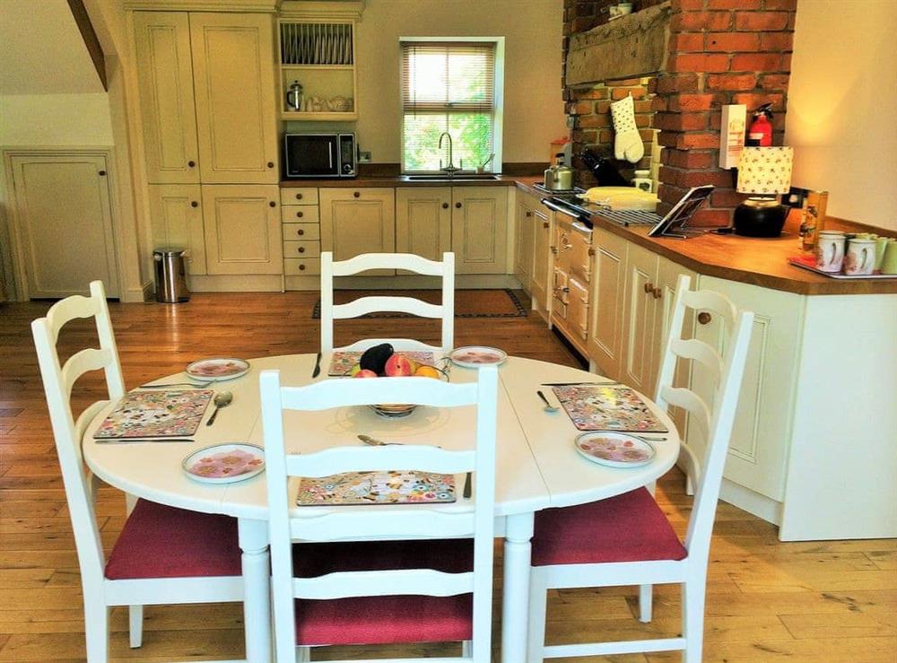 Reverse view of the spacious dining / kitchen at Bumble Cottage in Newton-on-the-Moor, Northumberland., Great Britain