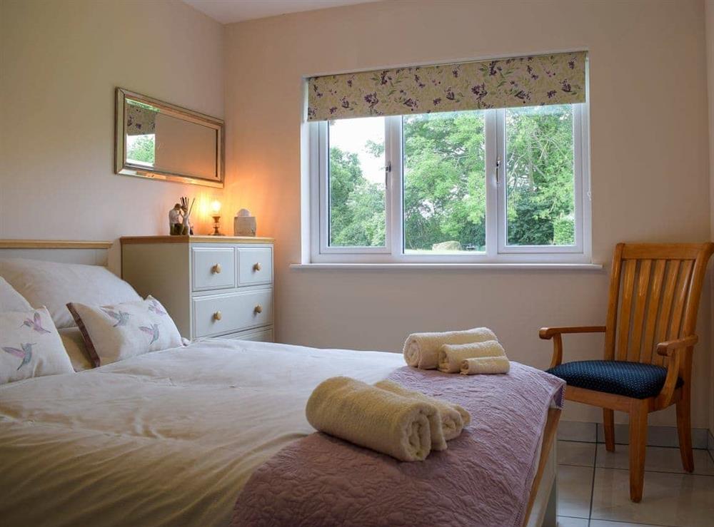 Double bedroom at Bumble Lodge in Crickheath, near Oswestry, Shropshire