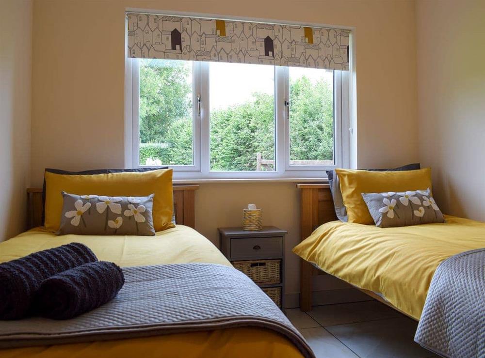 Twin bedroom at Bumble Lodge in Crickheath, near Oswestry, Shropshire