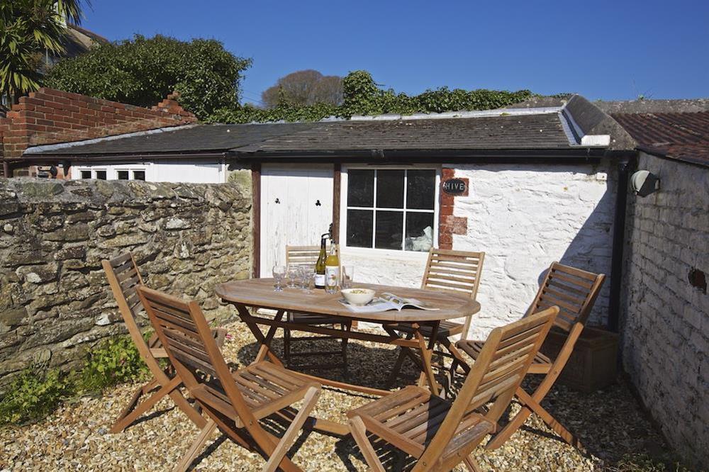 Patio area at the rear of the property at Bumblebee Cottage in 7 Shadycombe Road, Salcombe