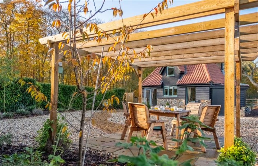 Enjoy the peace and quiet in the garden at Bumblebee Cottage, Culford Heath near Bury Saint Edmunds