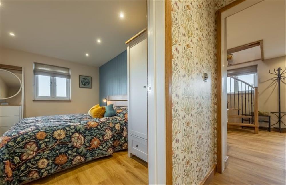 The master bedroom is off the living area at Bumblebee Cottage, Culford Heath near Bury Saint Edmunds