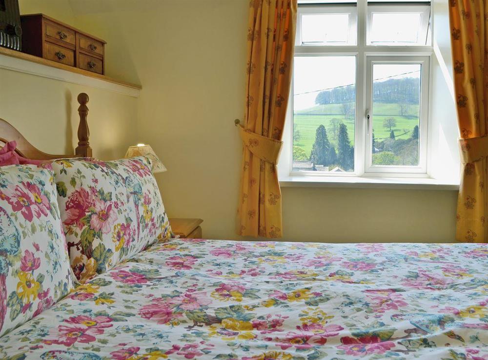 Double bedroom with countryside views at Bumblebee Cottage in Marske near Richmond, North Yorkshire