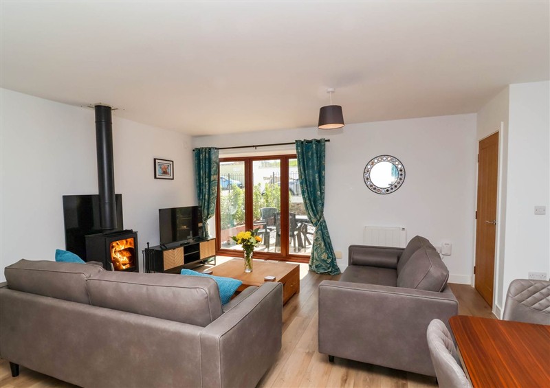 Relax in the living area at Bumblebee Meadows, Parkham near Bideford