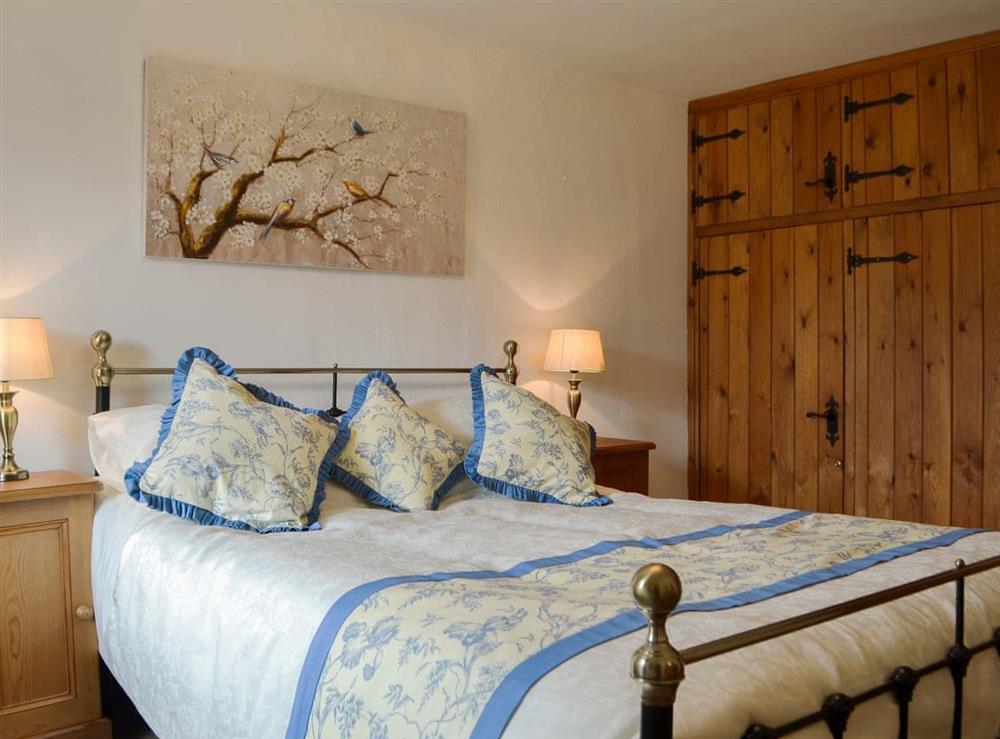 Double bedroom with ample storage at Bumblebee Nook in Yanwath, near Penrith, Cumbria