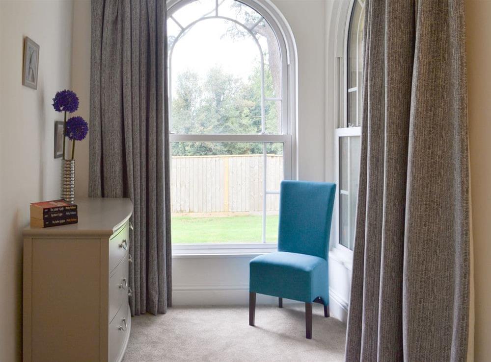Window seating area within the twin bedroom at Chester, 