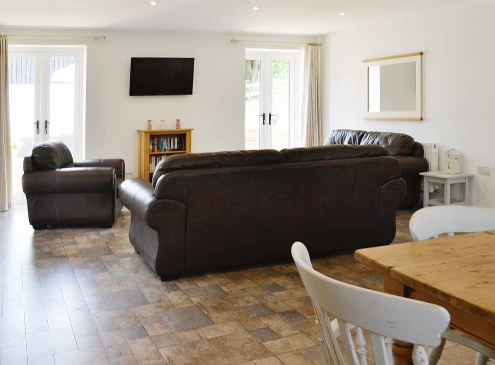 Open plan living space at Burghley Barn in Tetford, near Horncastle, Lincolnshire