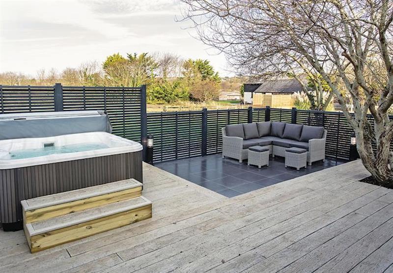 Hot tub and terrace in the Godolphin Stable at Burn Park in Stratton, Nr Bude