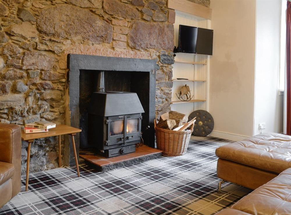 Welcoming living room at Burnbrae Cottage in Bridgend of Lintrathen, near Forfar, Angus